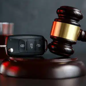 Gavel beside car key