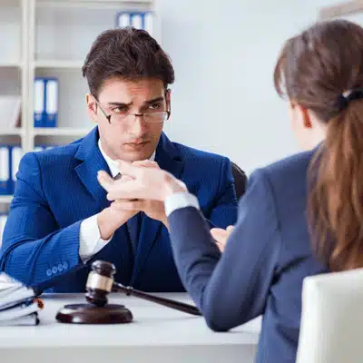 Attorney consulting a client in office about expungement Montana options and clearing past misdemeanor charges