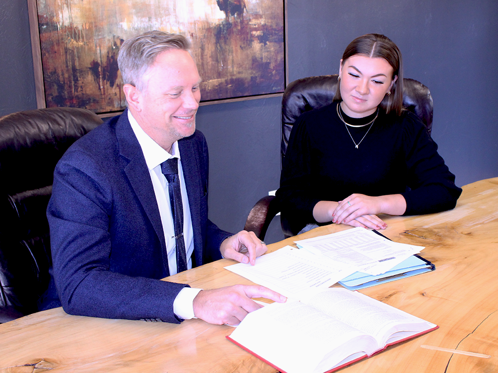 attorney consulting with a client